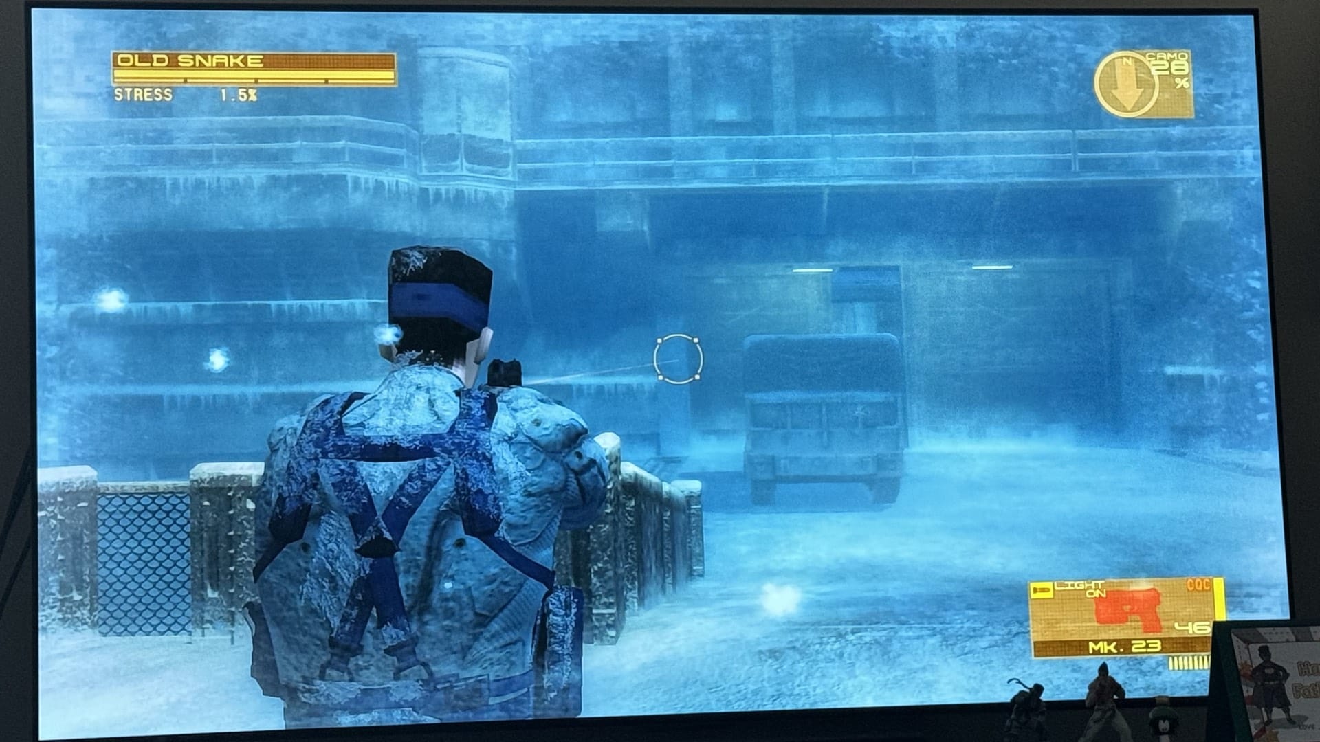 Old Snake standing in the snow at the Shadow Moses Heliport, remade in PlayStation 3 graphics